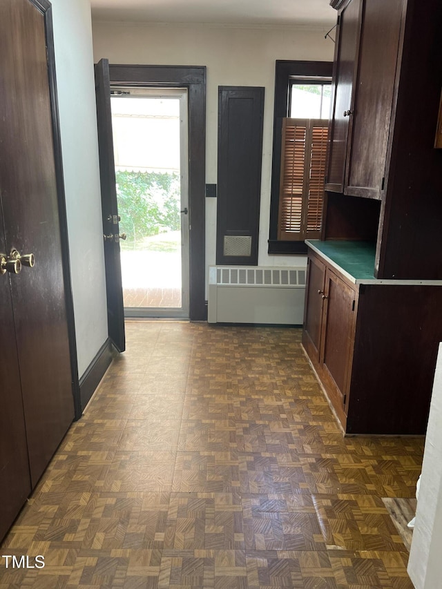 doorway featuring radiator heating unit