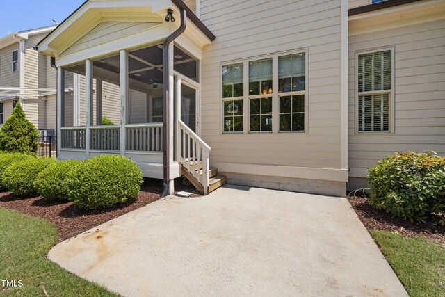property entrance featuring a patio