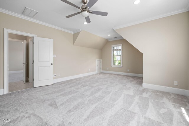 additional living space featuring light carpet, baseboards, a ceiling fan, recessed lighting, and vaulted ceiling