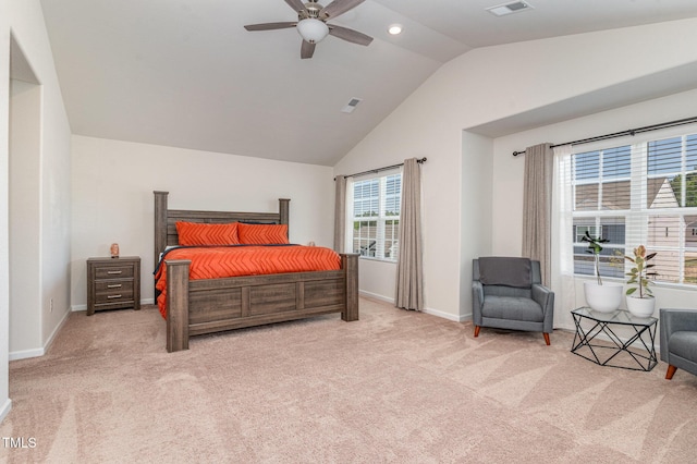 bedroom with carpet floors, baseboards, visible vents, and lofted ceiling