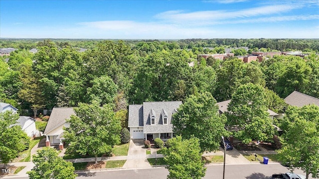 bird's eye view featuring a forest view