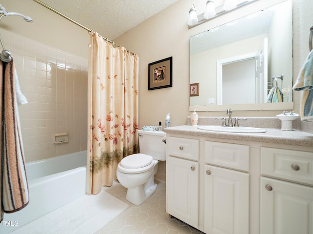 725 Van Thomas Dr, Raleigh, NC 27615 - bathroom with toilet, shower / bath combo with shower curtain, vanity, tile patterned floors, and a textured ceiling