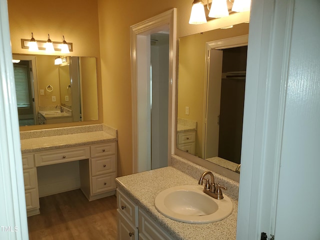 725 Van Thomas Dr, Raleigh, NC 27615 - bathroom with vanity and wood finished floors