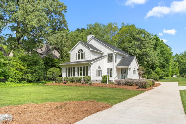 1925 W Lake Dr, Burlington, NC 27215 - view of front of house featuring a chimney, a front yard, and crawl space