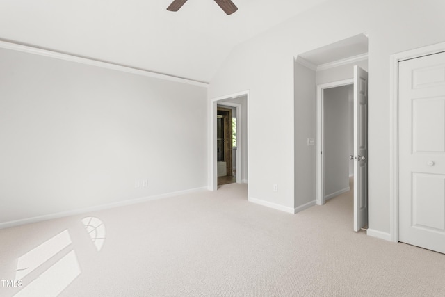 1925 W Lake Dr, Burlington, NC 27215 - unfurnished bedroom featuring a ceiling fan, light carpet, baseboards, ornamental molding, and lofted ceiling