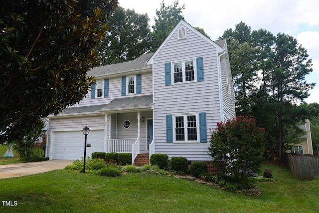 2528 Beech Gap Ct, Raleigh, NC 27603 - traditional home with concrete driveway, covered porch, a shingled roof, and a garage