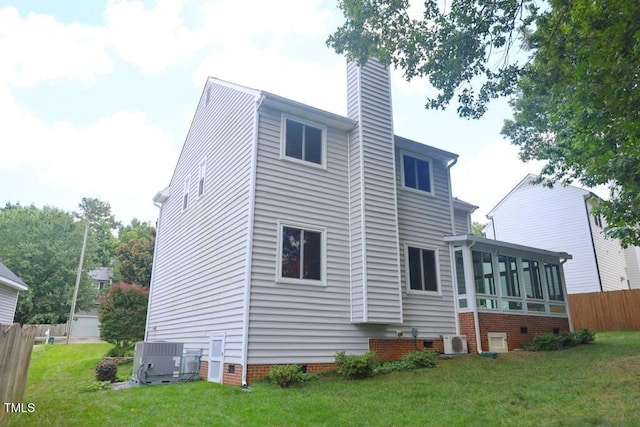 2528 Beech Gap Ct, Raleigh, NC 27603 - back of property featuring crawl space, a chimney, and a sunroom