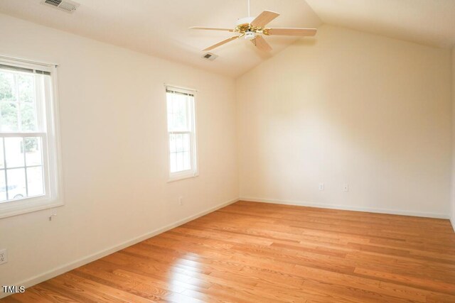 2528 Beech Gap Ct, Raleigh, NC 27603 - unfurnished room with plenty of natural light, light wood finished floors, lofted ceiling, and a ceiling fan