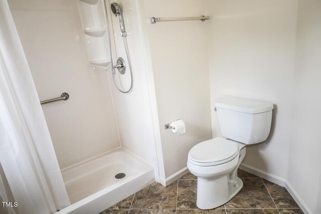 2528 Beech Gap Ct, Raleigh, NC 27603 - bathroom featuring a stall shower and baseboards