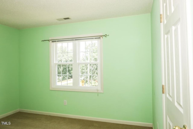 2528 Beech Gap Ct, Raleigh, NC 27603 - unfurnished room with carpet floors and a textured ceiling