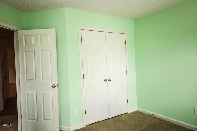 2528 Beech Gap Ct, Raleigh, NC 27603 - unfurnished bedroom featuring a closet and dark colored carpet