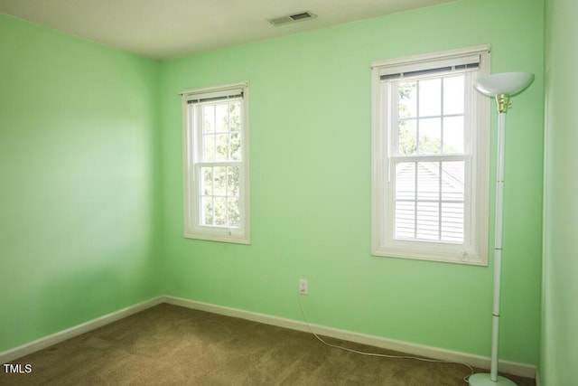 2528 Beech Gap Ct, Raleigh, NC 27603 - spare room with baseboards and dark colored carpet
