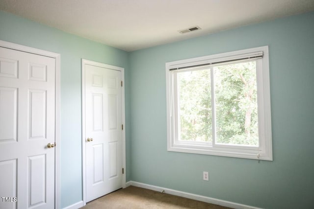 2528 Beech Gap Ct, Raleigh, NC 27603 - unfurnished bedroom with carpet and baseboards