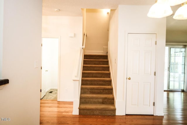2528 Beech Gap Ct, Raleigh, NC 27603 - staircase with wood finished floors
