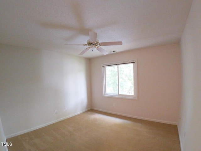 2528 Beech Gap Ct, Raleigh, NC 27603 - spare room featuring a ceiling fan and light colored carpet