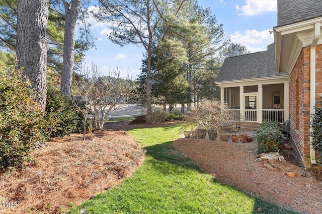 1317 Colonial Club Rd, Wake Forest, NC 27587 - view of yard featuring a sunroom