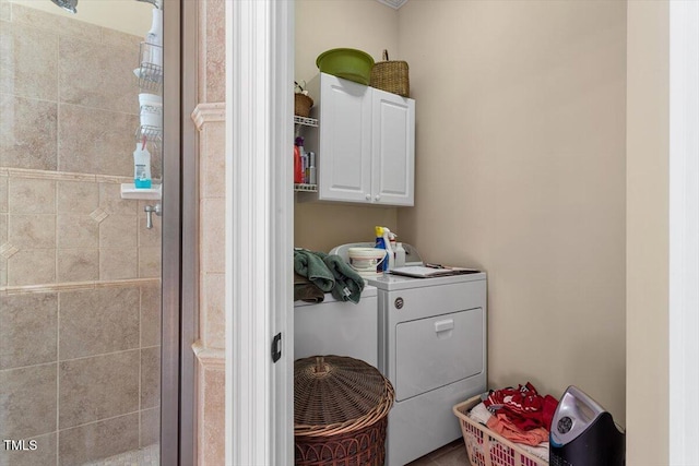 1317 Colonial Club Rd, Wake Forest, NC 27587 - washroom featuring washer / dryer and cabinet space
