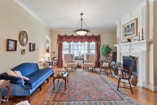 1317 Colonial Club Rd, Wake Forest, NC 27587 - living area featuring a fireplace, wood finished floors, and crown molding