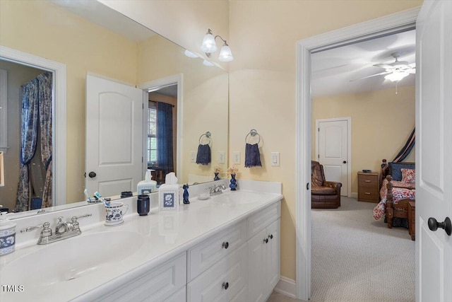 1317 Colonial Club Rd, Wake Forest, NC 27587 - ensuite bathroom featuring double vanity, ensuite bath, a ceiling fan, and a sink