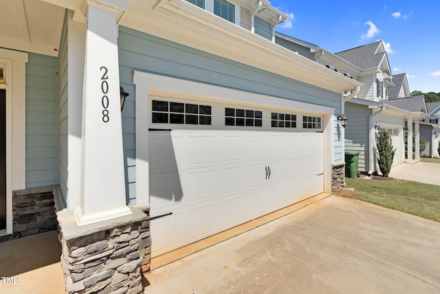 garage with driveway