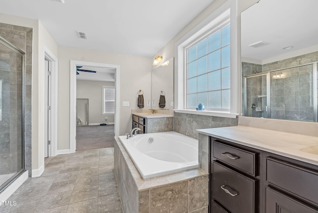 full bath featuring visible vents, a shower stall, and plenty of natural light