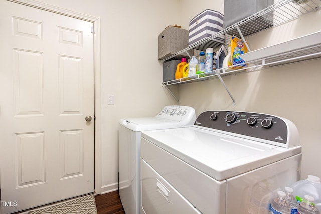 46 S Great White Way, Clayton, NC 27527 - clothes washing area with baseboards, dark wood-type flooring, washer and clothes dryer, and laundry area