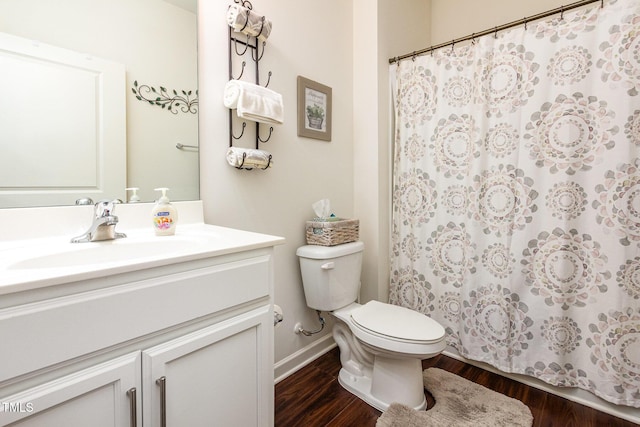 46 S Great White Way, Clayton, NC 27527 - bathroom featuring a shower with curtain, toilet, baseboards, wood finished floors, and vanity