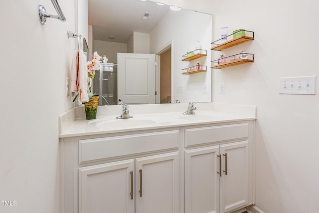 46 S Great White Way, Clayton, NC 27527 - full bath featuring a shower stall, visible vents, a sink, and double vanity