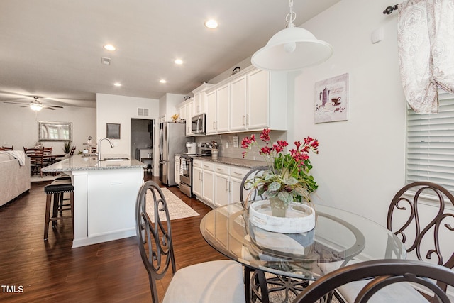 46 S Great White Way, Clayton, NC 27527 - dining room featuring recessed lighting, visible vents, a ceiling fan, and dark wood-style floors