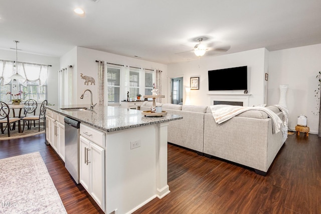 46 S Great White Way, Clayton, NC 27527 - kitchen featuring stainless steel dishwasher, a sink, white cabinetry, a ceiling fan, and light stone countertops