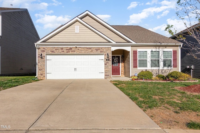 46 S Great White Way, Clayton, NC 27527 - view of front of house with an attached garage, driveway, and stone siding