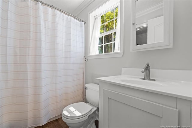 626 Bailey Rd, Coats, NC 27521 - full bathroom featuring curtained shower, wood finished floors, toilet, vanity, and ornamental molding