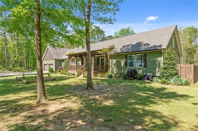 626 Bailey Rd, Coats, NC 27521 - ranch-style home featuring an attached garage, covered porch, fence, and a front yard
