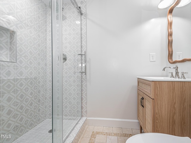 3009 Hillmer Dr, Raleigh, NC 27609 - full bath featuring a shower stall, tile patterned flooring, and vanity