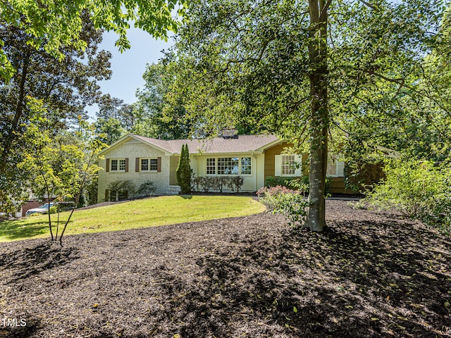 3009 Hillmer Dr, Raleigh, NC 27609 - ranch-style home featuring a front lawn