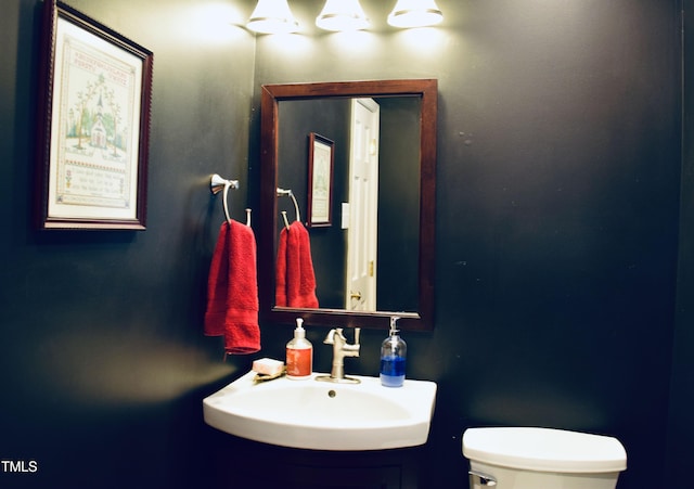 775 Sid Eaves Rd, Youngsville, NC 27596 - bathroom with toilet and a sink