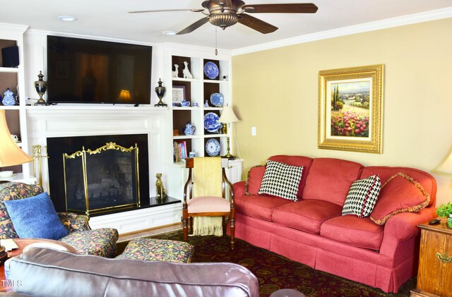 775 Sid Eaves Rd, Youngsville, NC 27596 - living room featuring recessed lighting, a ceiling fan, crown molding, and a fireplace with raised hearth