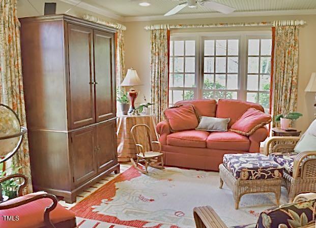 775 Sid Eaves Rd, Youngsville, NC 27596 - sitting room with crown molding, a ceiling fan, and wood finished floors