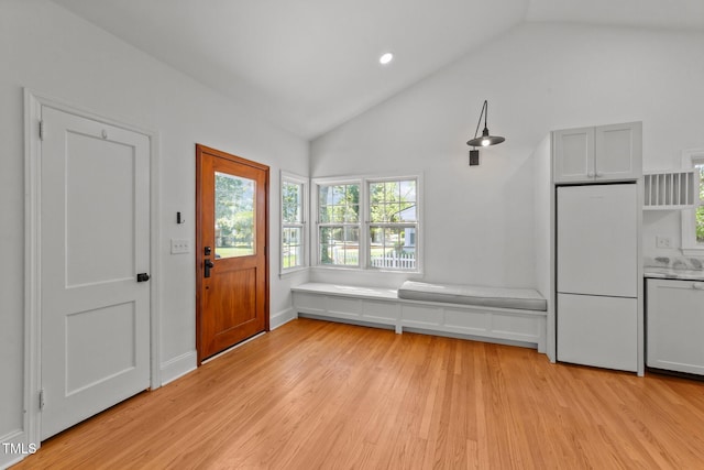 207 N Aiken St, Fuquay Varina, NC 27526 - entryway with light wood-style flooring and lofted ceiling