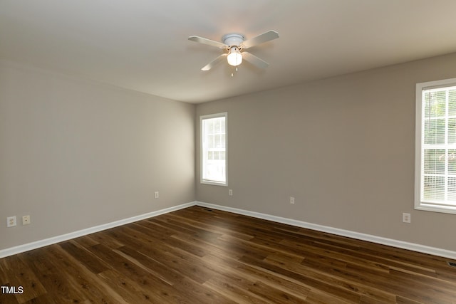 518 S Coalport Dr, Apex, NC 27502 - empty room featuring a ceiling fan, dark wood finished floors, and baseboards