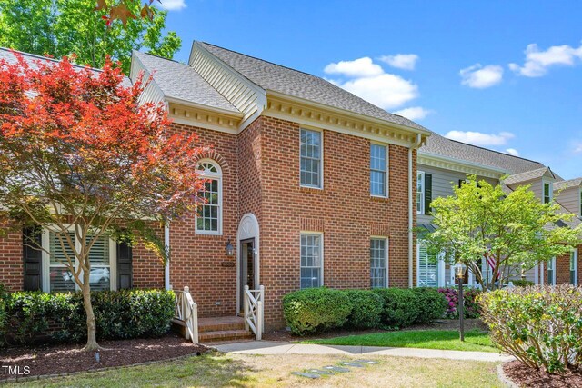 6000 Tenter Banks Sq, Raleigh, NC 27609 - view of front facade with a shingled roof and brick siding