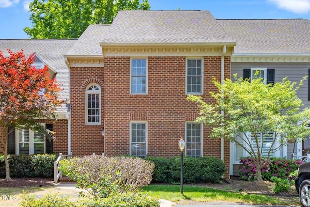 6000 Tenter Banks Sq, Raleigh, NC 27609 - view of side of property with brick siding and roof with shingles