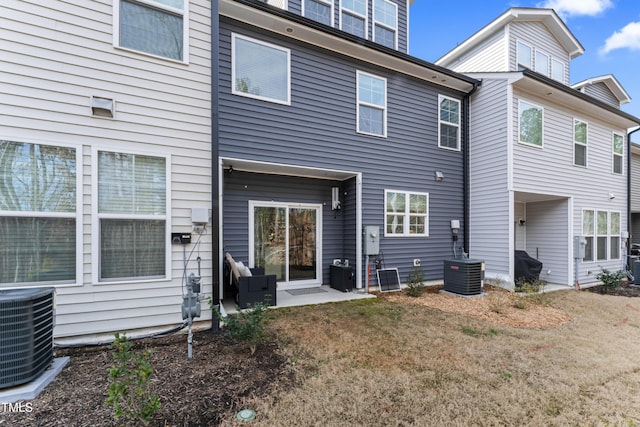 back of property with central AC unit