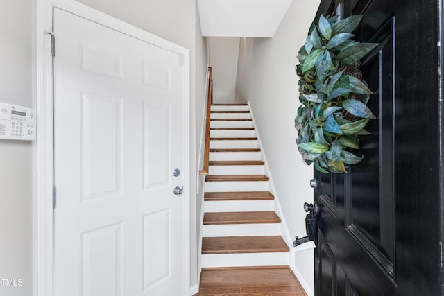 2705 Wyntercrest Ln, Durham, NC 27713 - stairs featuring baseboards and wood finished floors