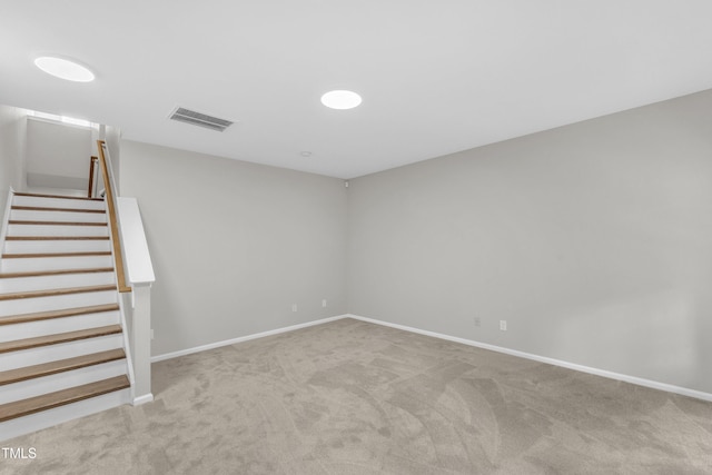 2705 Wyntercrest Ln, Durham, NC 27713 - interior space featuring carpet flooring, baseboards, visible vents, and stairway