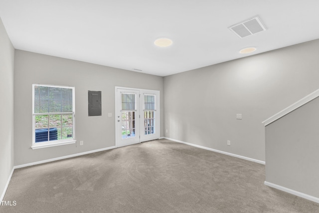 2705 Wyntercrest Ln, Durham, NC 27713 - carpeted spare room featuring visible vents, baseboards, and electric panel