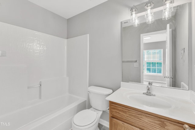 2705 Wyntercrest Ln, Durham, NC 27713 - bathroom featuring vanity, baseboards, toilet, and shower / washtub combination