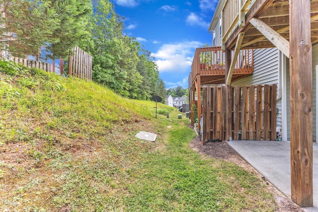 2705 Wyntercrest Ln, Durham, NC 27713 - view of yard featuring fence and a deck