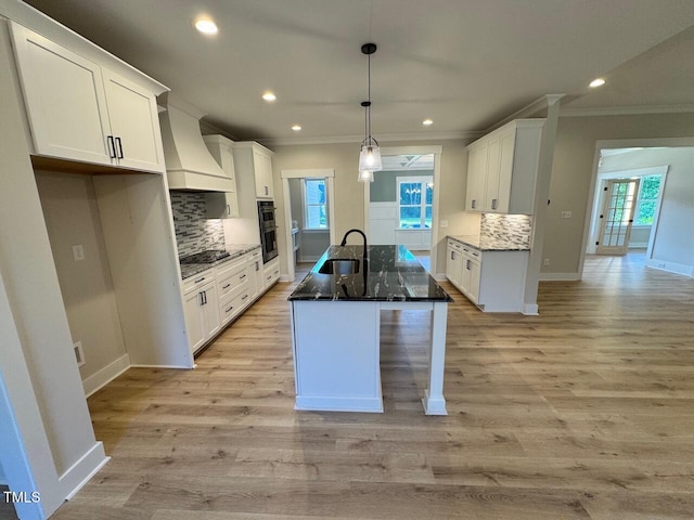 27 Batten Hill Ln, Selma, NC 27576 - kitchen with custom range hood, ornamental molding, backsplash, black electric stovetop, and white cabinets
