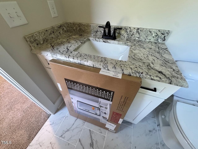 27 Batten Hill Ln, Selma, NC 27576 - bathroom view of toilet and vanity